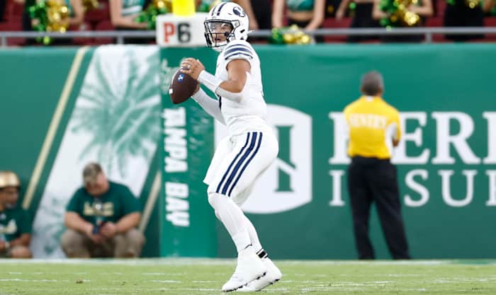 BYU quarterback Jaren Hall loads up to pass against the University of Southern Florida.